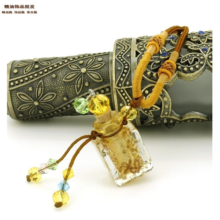 中国精油饰品网双扣绳金黄色方形金莎琉璃瓶项链1.jpg