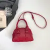 Bolsa Feminina Estilosa Texturizada de Ombro Cruzado Concha Moda Nova Primavera 2026 Casual Retrô Minimalista Tendência
