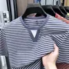 Camiseta de Manga Corta para Hombre de Seda de Hielo Sin Costuras 2026 Nuevo Estilo de Verano Cuello Redondo Rayas Fresca y Transpirable Camiseta de Manga Corta para Hombre Venta al por Mayor