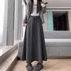 Foto real 2026 saia midi estilo designer com forro de fleece, espessa, modeladora, bom caimento, elegante, saia midi de caxemira de arroz glutinoso