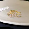 Anel aberto assimétrico de flor de zircônia banhado a ouro 18K real, anel da moda para o dia a dia, joia de luxo leve e de alta qualidade