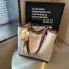 Bolsa de verão transfronteiriça de grande capacidade para mulheres 2026 nova bolsa de ombro para o dia a dia com blocos de cores da moda bolsa de mão de alta qualidade bolsa tote