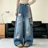 Ropa de Otoño para Niñas American Graffiti Pantalones de Mezclilla Estilo Nuevo 2026 Pantalones Anchos Estampados para Niños Medianos y Grandes Pantalones Rectos Pantalones Largos