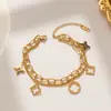 Pulseira de Aço Titânio com Trevo de Quatro Folhas Vazado Dupla Camada Transfronteiriça para Meninas, Luxo Acessível, Joia de Mão Moderna e Versátil, Corrente Grossa Estilo Simples Ins