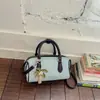 2026 Otoño Nuevo Estilo Coreano Retro Bolso de Hombro de Moda Más Vendido Color Sólido para Viajes Diarios Bolso Cruzado Tipo Cubo
