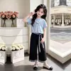 2026 Nuevo Elegante Moderno Delgado Manga Corta Top Niñas Cuadros Pantalones de Pierna Ancha Casual Conjunto de Dos Piezas Moderno