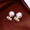 Pendientes de borla con flor de trébol de circonita vintage con un toque de alta gama, pendientes versátiles y de moda al por mayor