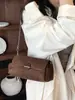 Bolsos de Diseño de Nicho para Mujer 2026 Nuevo Bolso de Hombro Retro de Alta Gama Moda Súper Caliente Bolso Cruzado de un Solo Hombro Transfronterizo