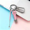Llavero de Dibujos Animados Lindo Cortauñas Cuchara para Oídos Set Simple de Llaves Colgante para Niñas Cortauñas Pequeño de Bayas Cerradura