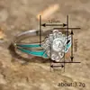 Anel de Flor Retro Criativo Cao Shi Anel de Flor Margarida com Gota de Óleo para Mulheres Anel Exquisito com Zircônia Microincrustada