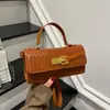 Bolso de Mano de Lujo Tejido 2026 Invierno Nueva Moda Elegante Versátil Texturizado Simple Casual Bolso de Hombro Cruzado