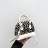 2024 Invierno Elegante Bolso Concha Nuevo Moderno Casual Ins Hombro Cruzado Costuras Estampado Leopardo Moda Textil Bolso de Mujer