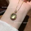 Venta al mayoreo del fabricante: Colgante de cadena para clavícula ovalado de jade de agua natural, incrustación de plata S925, un diseño simple y versátil