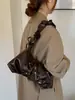 Bolso de hombro de nicho transfronterizo Otoño 2026 con lazo plisado, Bolso tipo dumpling de moda