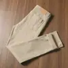 Pantalones casuales rectos ajustados versátiles de color otoño para hombre, suaves, elásticos, de sarga, estilo americano de cinco bolsillos, para negocios