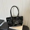 Versión coreana 2026 del hermoso y simple bolso de hombro único de gran capacidad, de moda para el verano, con lazo