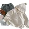 Capa Base con Capucha Infantil Bangcheng 2026 Nueva Llegada de Invierno para Niños Color Liso Auto-Calentable Suéter Superior Ropa de Invierno Versátil