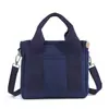 Bolso de lona de comercio exterior nuevo con gran capacidad y múltiples compartimentos, bolso de mano cruzado versátil y casual para el día a día y bolso de hombro para mujer