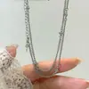 Collar de cruz de plata de ley S925 para mujer, estilo largo versátil, lujo ligero, elegante, con borla y cadena lisa