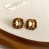 Pendientes de borla con carcasa de madera marrón transfronterizos europeos y americanos, pendientes de estilo vintage Maillard, pendientes de mujer de lujo ligero de alta gama