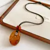 Colar de Cordão de Cera com Pingente Longo de Pérolas em Forma de Gota Estilo Étnico Vintage Corrente para Suéter Joia Versátil de Nicho para Mulheres com Toque de Luxo