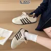 Zapatos de entrenamiento alemanes de estilo retro con cordones de cuero genuino, nuevos zapatos deportivos casuales versátiles para mujer de suela blanda, principios de otoño 2026