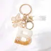 Llavero Colgante de Borla con Letra Inglesa Personalizada de Purpurina Blanca con Resina Epoxi y Colgante de Resina con Pan de Oro, Llavero Sencillo
