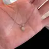 Collar Nudo de Cuerda Brillante para Mujer, Lujo Accesible Diseño de Nicho, Colgante Cubo de Azúcar de Circonita de Gama Alta, Cadena para Clavícula Exquisita y Versátil