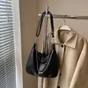 Diseño de nicho transfronterizo moda retro bolsa de mano simple bolsa cruzada casual para ir al trabajo gran capacidad bolsa de hombro única