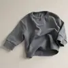Camiseta informal de estilo coreano para bebés y hombres, con hebilla abierta, cómoda y combinable, con cuello redondo grueso, para primavera y otoño.