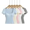 7599-25 verano versión coreana de ajuste ceñido cuello redondo grande color caramelo manga corta con almohadilla extendida en el pecho camiseta chaleco de punto
