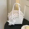 Bolso de hombro para debajo del brazo de diseño nicho transfronterizo, nuevo bolso de mujer primavera 2026, bolso cuadrado pequeño simple de alta calidad