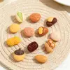 Juguetes de comida de simulación nueces pistachos cacahuetes castañas pegamento de crema DIY accesorios de resina Crocs cadena para teléfono pegatinas