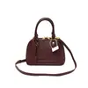 Bolsa de concha de diseño de nicho de comercio exterior versátil de mano 2026 nueva elegante y con estilo para mujer bolso de un solo hombro bandolera