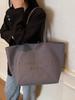 Bolsa Tote de Lona Casual de Grande Capacidade com Letras para Mulheres 2025 Novo Estilo Roupa de Trabalho Simples para o Trabalho Bolsa de Ombro de Alto Valor