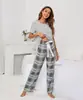 Fotos Reais Novos Produtos Estação Independente Transfronteiriça Europeia e Americana Conjunto Casual Feminino de Cor Sólida com Gola Redonda e Estampa T-check Roupas de Casa Pijamas para Mulheres