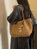 Bolso tejido retro 2026 de alta gama, nuevo diseño de moda, bolso de hombro de gran capacidad para ir al trabajo, bolso tote para debajo del brazo, estilo popular