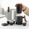 Juego de té kung fu portátil de viaje de cerámica negra, juego pequeño para exteriores, taza exprés simple, una tetera, cuatro tazas, taza de té individual