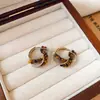 Pendientes de borla con carcasa de madera marrón transfronterizos europeos y americanos, pendientes de estilo vintage Maillard, pendientes de mujer de lujo ligero de alta gama