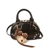Bolso de Mano Simple y de Alta Gama Estilo Nuevo para Mujer Primavera 2026 Cuero Vintage con Cera de Aceite Bolso Bowling Elegante Bolso Cruzado
