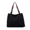 Bolso casual nuevo de gran capacidad para mujer, bolso de hombro de moda para el trabajo, bolso tote de lona simple y versátil, bolsa de compras, moderno