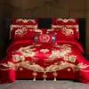 Juego de cuatro piezas para boda, todo algodón, festivo, diseño de dragón y fénix, ropa de cama de algodón puro para bodas, recién casados y parejas recién casadas, con una funda de edredón rojo brillante
