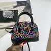 Otoño/Invierno 2026 Nuevo Estilo Lentejuelas Brillantes de Moda Bolso Pequeño de Concha Bolso Cruzado para Mujer Bolso de Hombro Único de Venta Caliente de Comercio Exterior