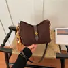 Bolso de hombro bajo estilo retro de alta costura Shuai Mi Jia para mujer, nuevo bolso cruzado de hombro de nicho de lujo ligero para otoño 2026