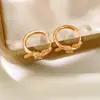 Aretes de Clip Redondos Nudosos de Zirconia Bañados en Oro Real de 18K, Pendientes de Estilo Minimalista con un Toque de Lujo Ligero y Gama Alta, Venta al por Mayor