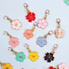 Colgante de Lazo de Aleación Flor de Cerezo Cierre Universal DIY Ropa Llavero Bolso Collar Pendiente Accesorios
