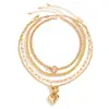 Collar de corazón multicapa europeo y americano con cuentas doradas y cadena gruesa, colgante en forma de corazón, cadena para la clavícula vintage para mujer al por mayor