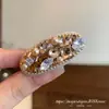Clip para el Cabello Ovalado con Perlas y Pedrería Color Champaña Nuevo Primavera/Verano 2026 Clip Elegante para Peinar Flequillos de la Frente Sensación de Alta Gama
