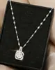 Versión Coreana Yunyao Oro Rosa 18K Lujo Cuadrado Diamante Colgante Acero de Titanio Collar para Mujeres Ins Tendencia Completo Diamante Gama Alta Lujo Ligero Candado