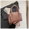 Bolsa de almohada transfronteriza para mujer 2026 Nuevo estilo Moda Popular Temperamento Bolsa de boliche Elegante Bolso de mano para hombro Cruzado Moderno